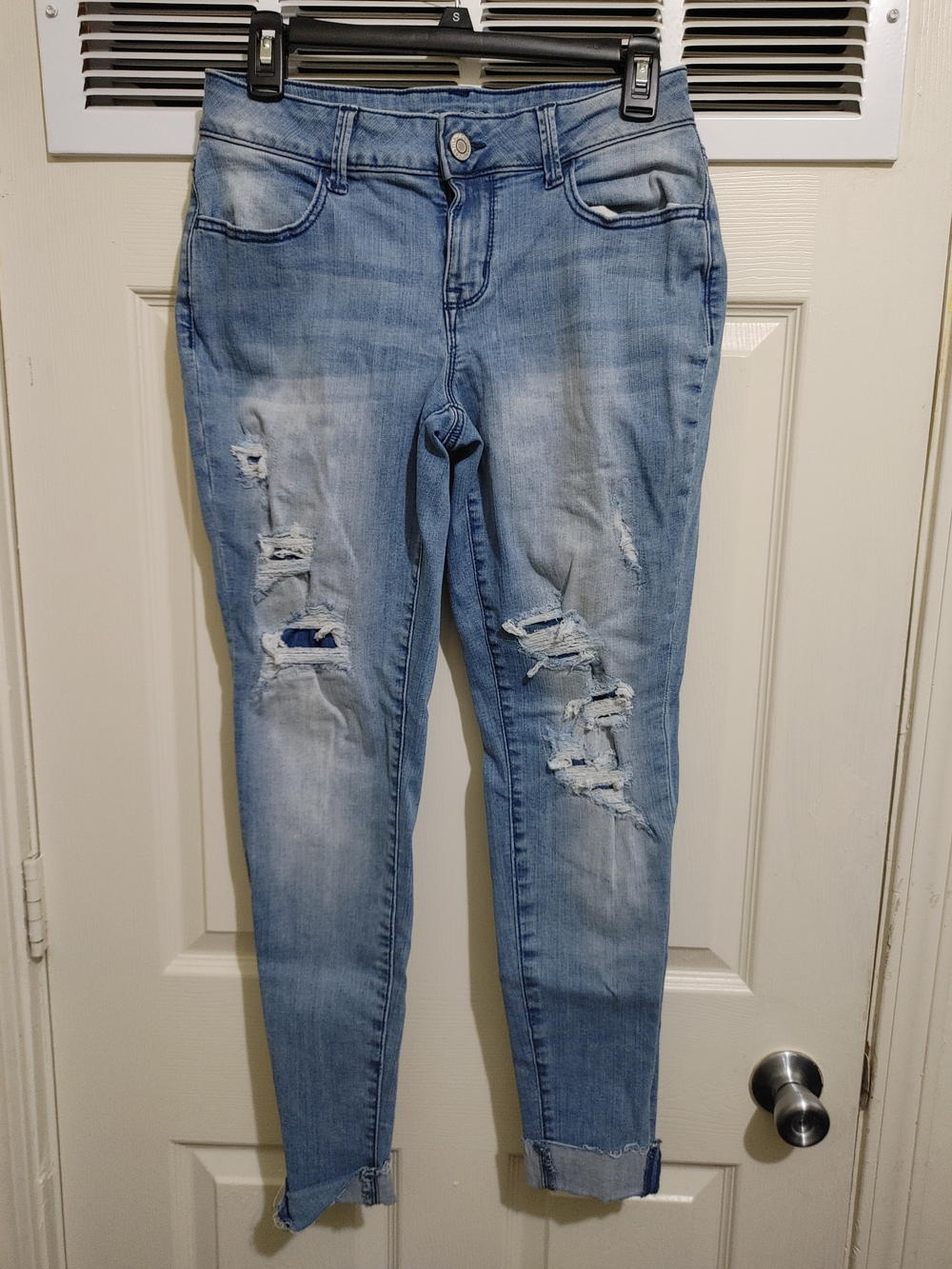 Women’s Light Blue Distressed Skinny Jeans